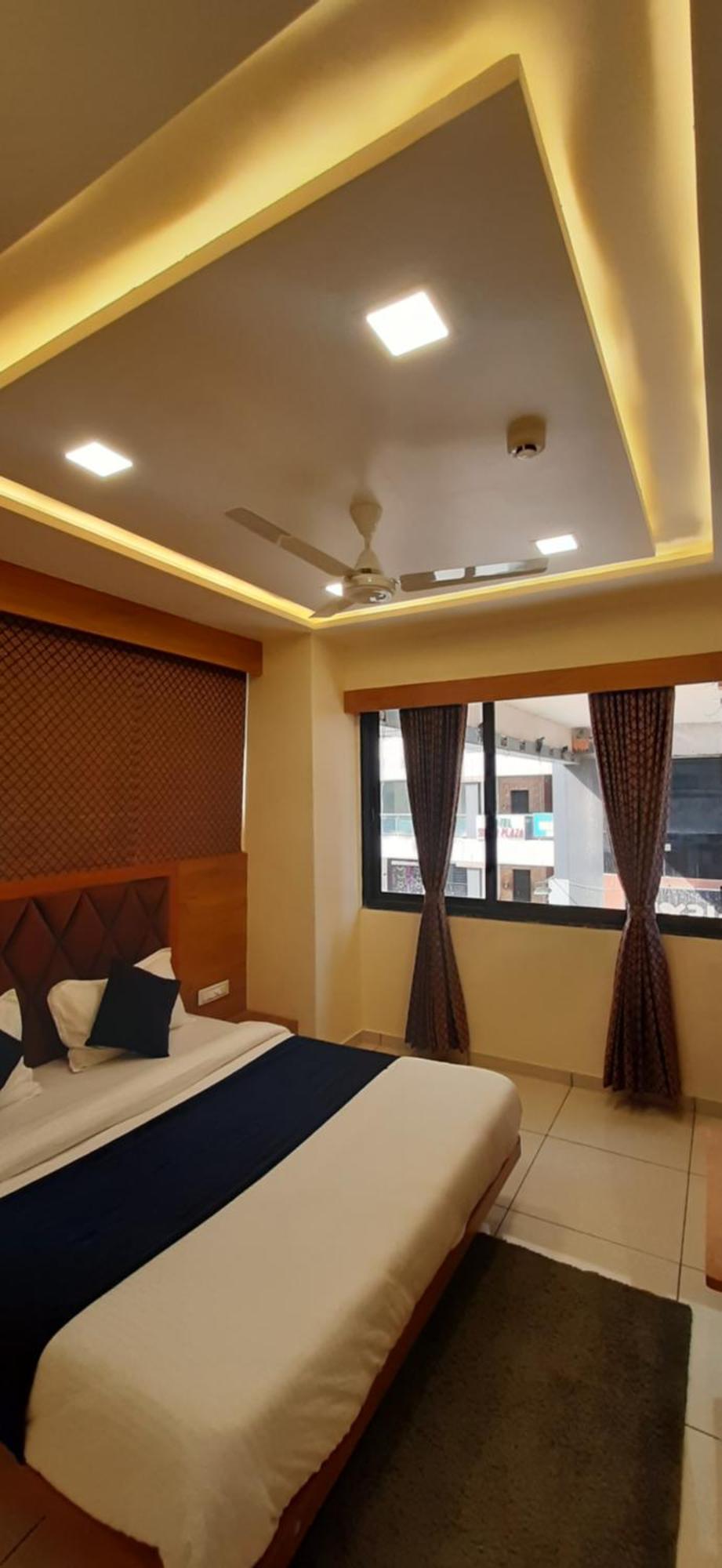 Hotel Suncity Ahmedabad Phòng bức ảnh
