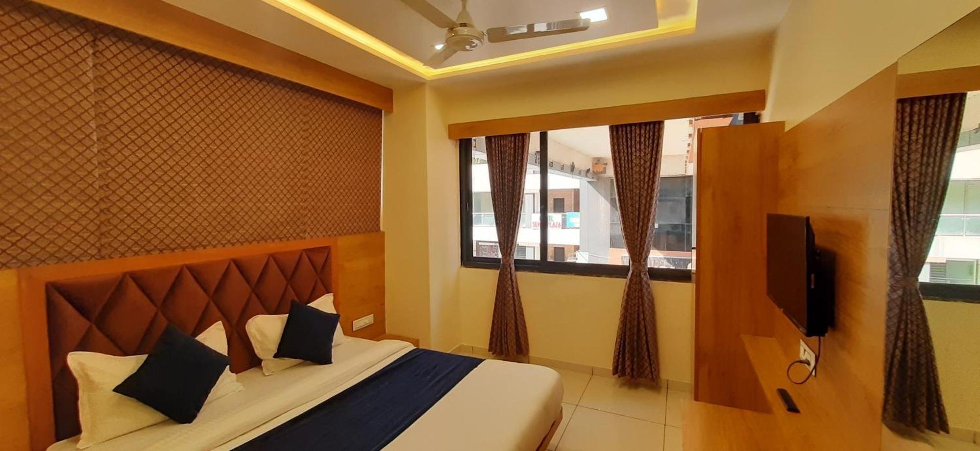 Hotel Suncity Ahmedabad Phòng bức ảnh